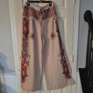 Bohemian Floral Wide-Leg Pants Size L to XL waist Is stretch in the back.